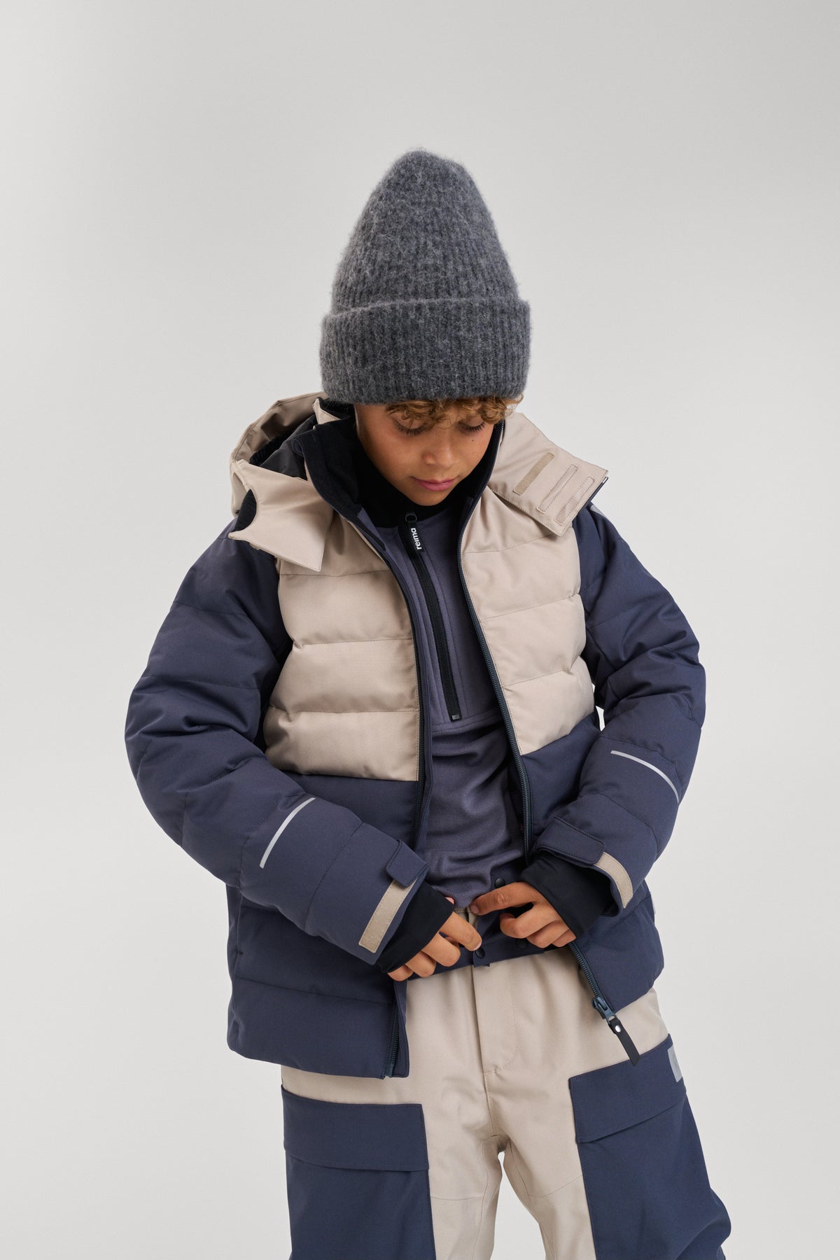 REIMA Kinder Skijacke / Winterjacke mit Primaloft Kuosku blau 5100091B grau-beige 9780