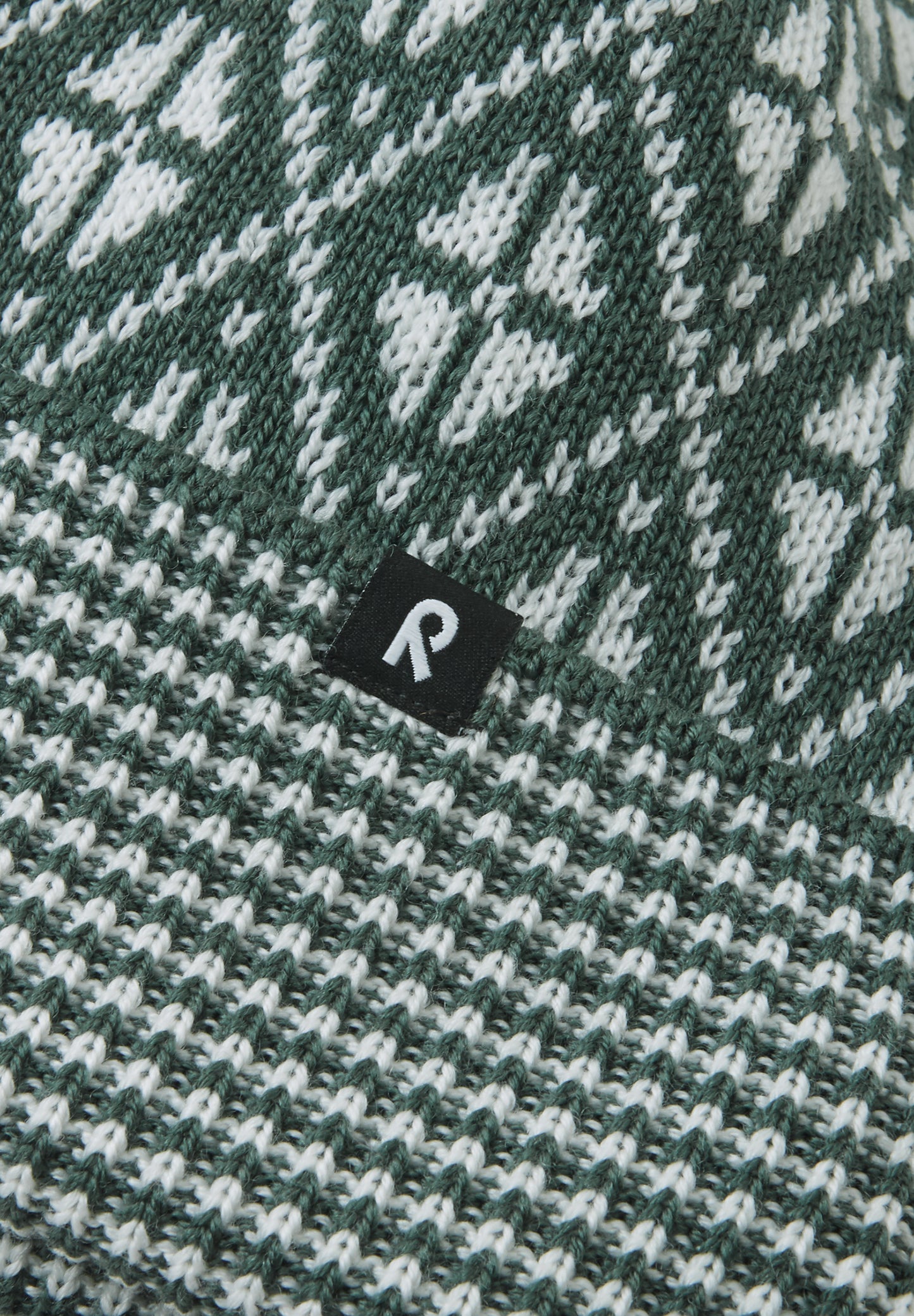 REIMA Mütze <br>Kuurassa <br>Gr. 48/50, 56/58 <br>innen hautfreundliches Fleece<br> aussen warme, wasserabweisende Merino-Wolle<br>Windstopper-Membrane im Ohrbereich