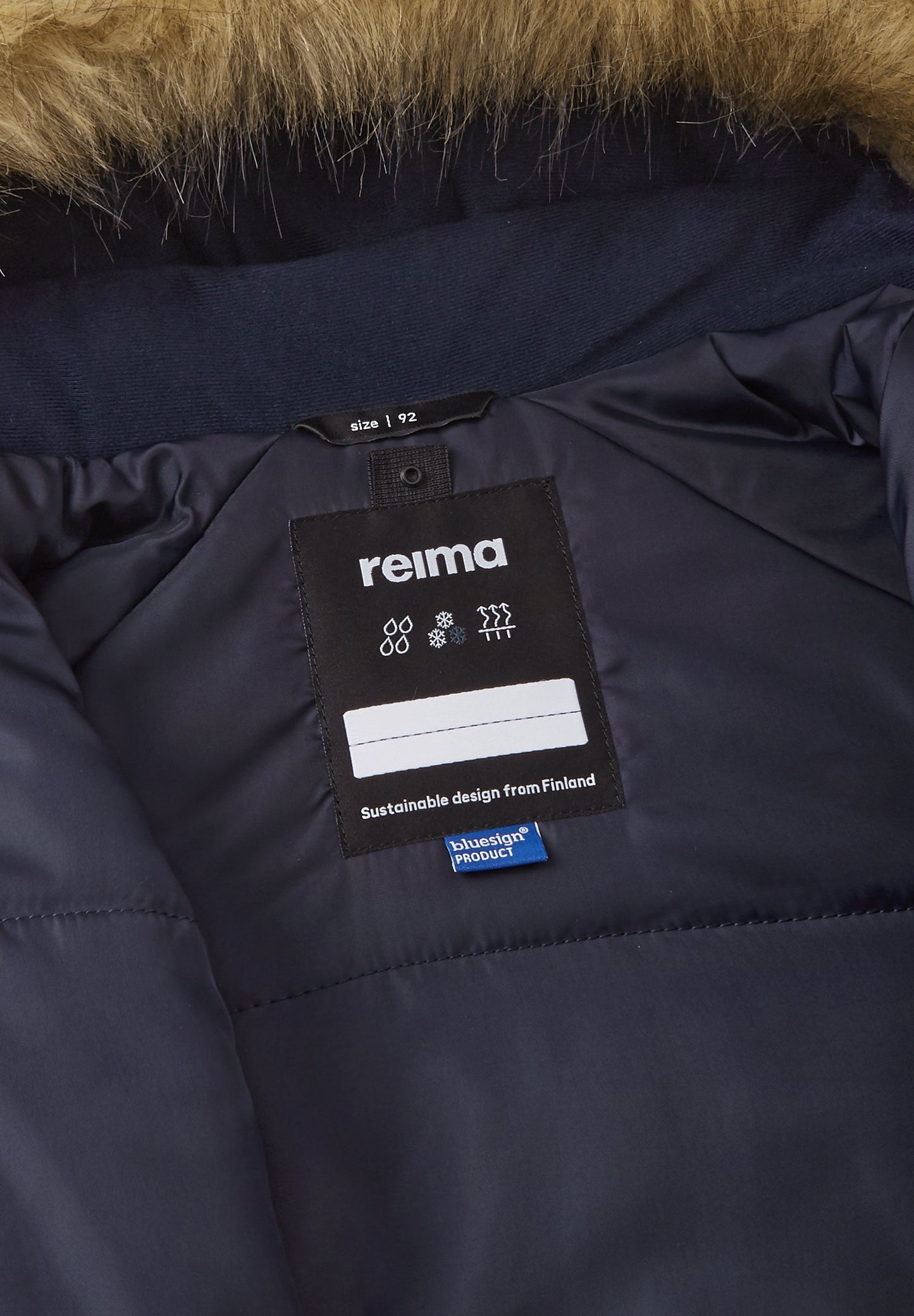 REIMA TEC Winteroverall/Skianzug <br>Lappi <br>Gr. 80 bis 98<br> Po-Bereich extra dick isoliert<br> Taille regulierbar<br> Kunst-Pelz abnehmbar<br> abnehmbare Fuss-Schlaufen<br> WS 15'000 mm