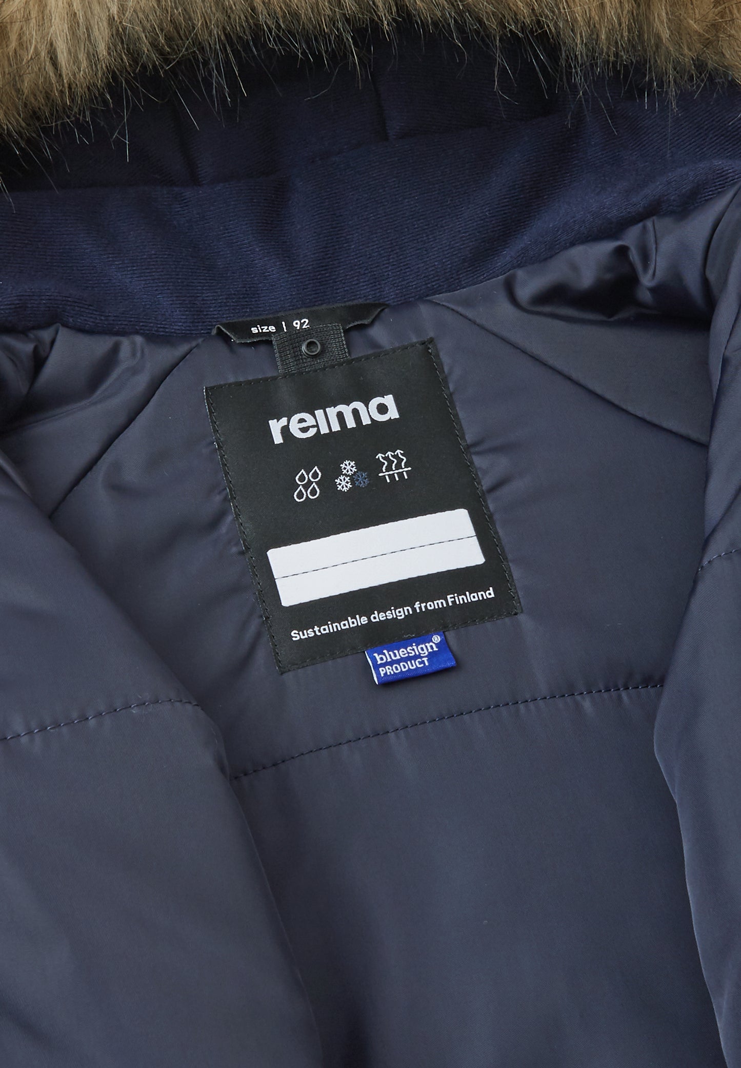 REIMA TEC Winteroverall/Skianzug <br>Lappi <br>Gr. 92, 98<br> Po-Bereich extra dick isoliert<br> Taille regulierbar<br> Kunst-Pelz abnehmbar<br> abnehmbare Fuss-Schlaufen<br> WS 12'000 mm