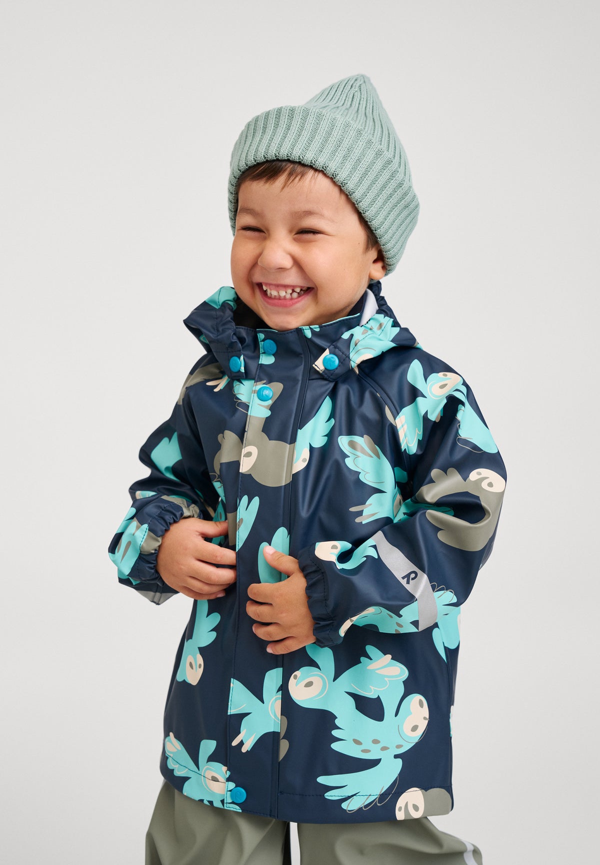 Reima Kinder Regenjacke / Matschjacke Vesi blau/mint gemustert 