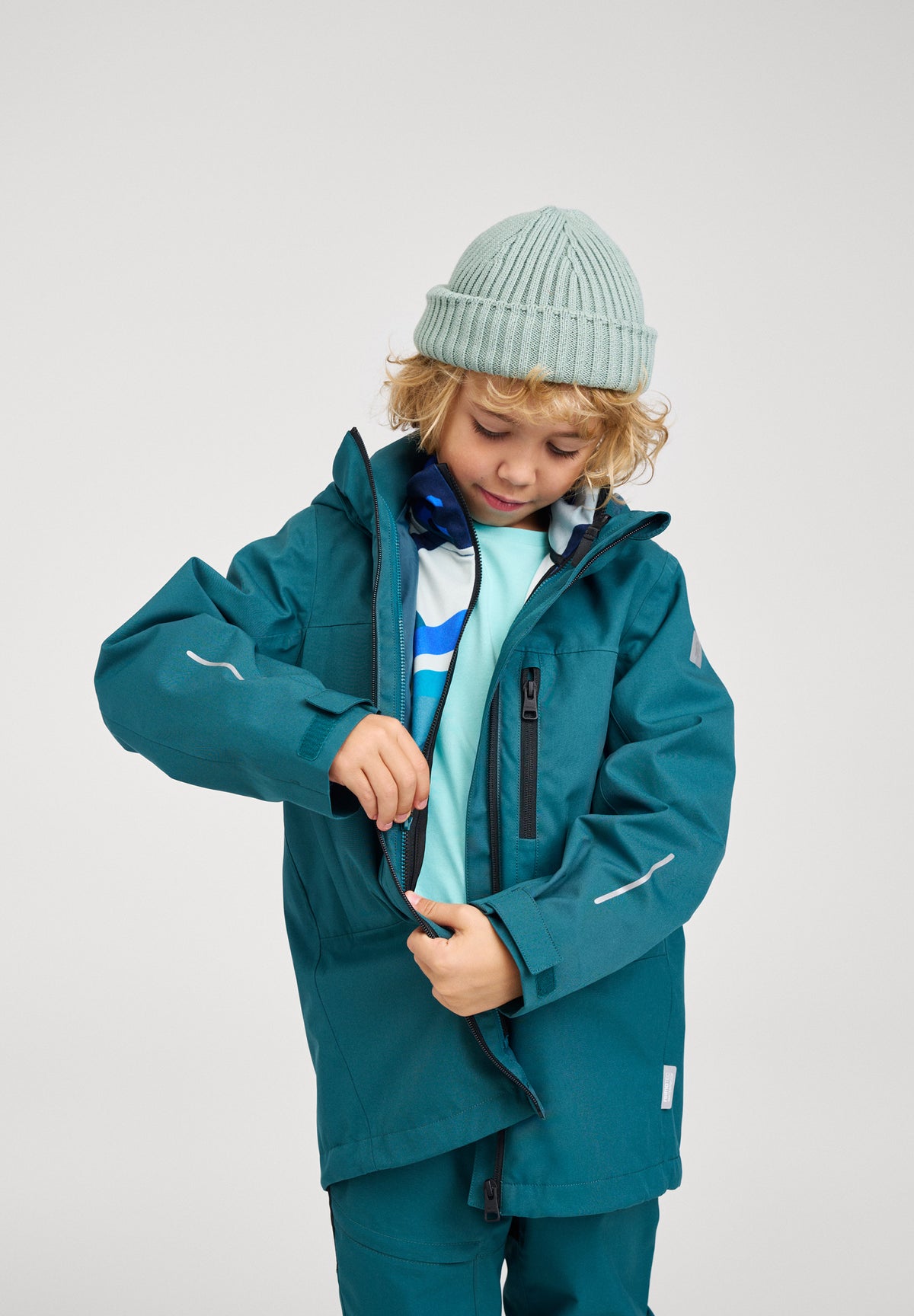 REIMA TEC Kinder Regenjacke Saarela 5100407A petrol-grün 7950