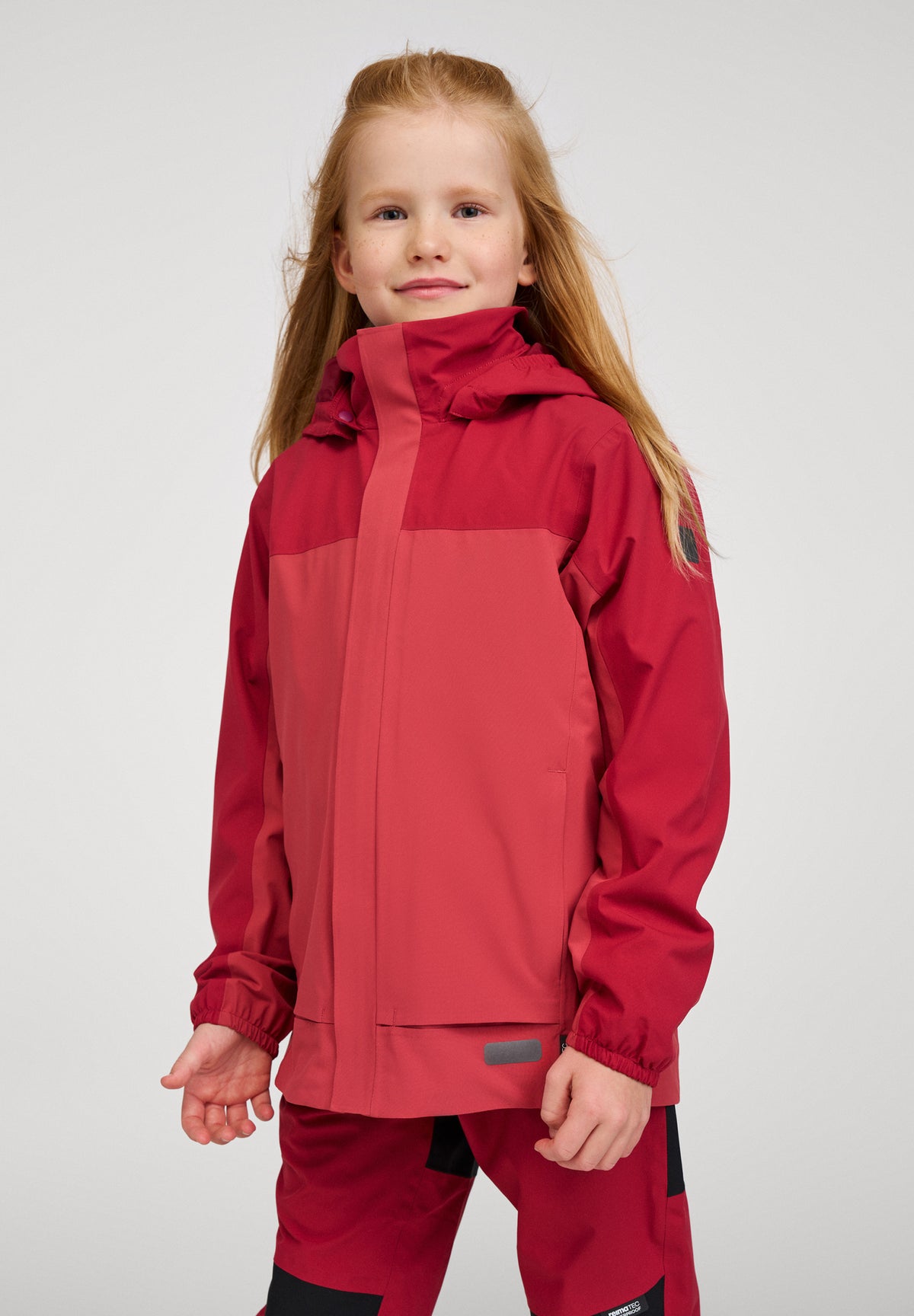 REIMA TEC Kinder Regenjacke Salmi terracotta-rot